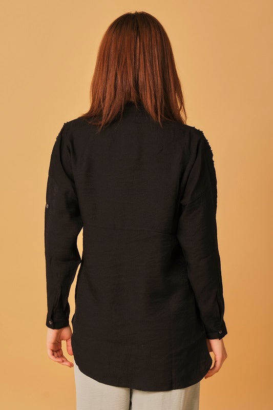 Embroidered black blouse